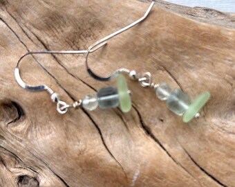 Genuine sea glass earrings.  Unaltered. Surf tumbled.  Sterling French ear wires. Uranium Glass