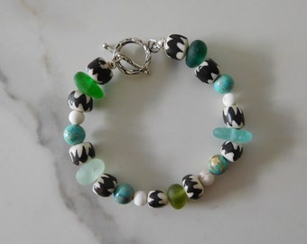 Real sea glass bracelet.  African Chevron beads.  Jasper.  Sea glass is unaltered.