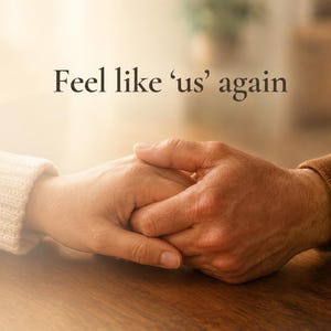 May include: Two hands held together, one wearing a cream-colored knit sleeve and the other a brown long-sleeved garment. Above the hands, the text 'Feel like 'us' again' is displayed in a dark brown, serif font against a soft, warm background.