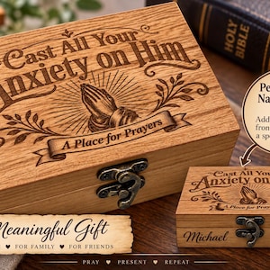 May include: A rectangular wooden prayer box with a metal latch, featuring the laser-engraved text Cast All Your Anxiety on Him, A Place for Prayers, and an illustration of praying hands. A smaller version shows the name Michael engraved on the front.