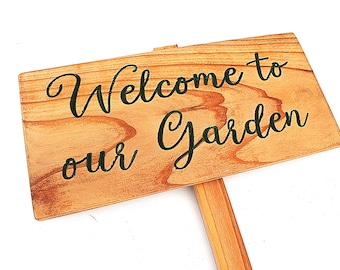 Bienvenidos a nuestro jardín. Letrero de jardín exterior.