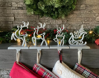 Set of 4/ Prancing Reindeer & Sleigh Silver Shimmer Christmas Stocking Holders - Stocking Holder Set  Mantel Hangers S81