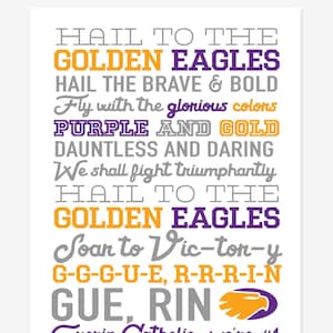 May include: A purple and gold cheer sign with the text "Hail to the Golden Eagles" and "Soar to Victory" with the school name "Guerin Catholic, we're #1".