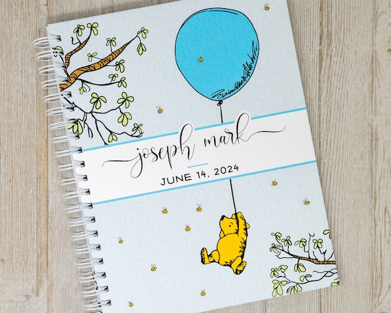 Winnie the pooh baby book hotsell first years