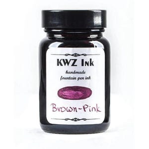 May include: A dark glass bottle of KWZ Ink handmade fountain pen ink with a black screw-top lid. The white label features the text KWZ Ink, handmade fountain pen ink, a purple-pink oval swatch, and the handwritten-style text Brown-Pink.