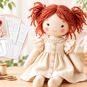 Puede incluir: Una muñeca de tela con cabello de lana rojo brillante en coletas, mejillas sonrosadas y un vestido color crema con botones y ribete de encaje. Junto a la muñeca hay varias hojas de papel impresas con patrones de costura e ilustraciones.