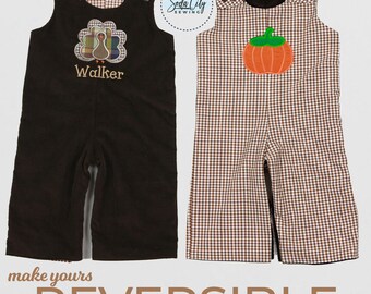 May include: Reversible brown corduroy overalls with a turkey applique and the name "Walker" embroidered on the front. The other side features a brown and white gingham pattern with a pumpkin applique.