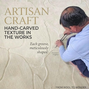 May include: A light-colored textile surface featuring hand-carved grooves. Text reads: ARTISAN CRAFT, HAND-CARVED TEXTURE IN THE WORKS, Each groove, meticulously shaped, Process in Progress, FROM WOOL TO WONDER. A tool is used to shape the material.