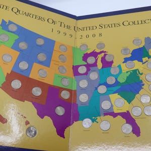May include: A folding collector's map of the United States featuring a colorful map of the 50 states with circular cutouts for 50 State Quarters. The text reads 50 State Quarters Of The United States Collector's Map 1999-2008 with coins inserted.