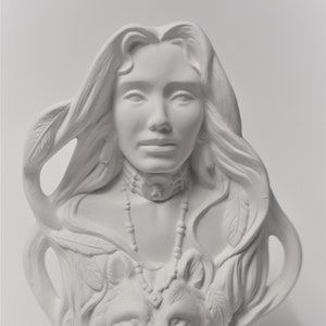 May include: White ceramic bust of a woman with long flowing hair and a wolf. The woman is wearing a necklace and has feathers in her hair. The wolf is partially visible behind her.