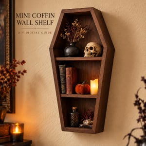May include: A dark brown wooden coffin-shaped wall shelf with three tiers. The text MINI COFFIN WALL SHELF DIY DIGITAL GUIDE is visible. The shelves hold a black vase with dried flowers, a skull, two books, a small pumpkin, a candle, and a glass bottle.