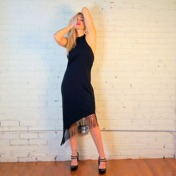 black dress with fringe hem