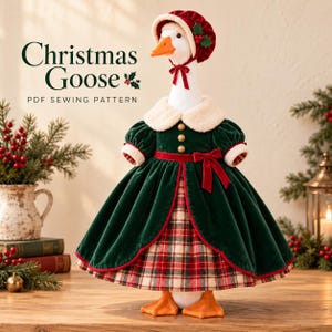 May include: A white goose figurine wearing a dark green velvet dress with a red plaid skirt, a cream-coloured collar, and a matching red velvet bonnet with holly accents. The text reads Christmas Goose PDF SEWING PATTERN.
