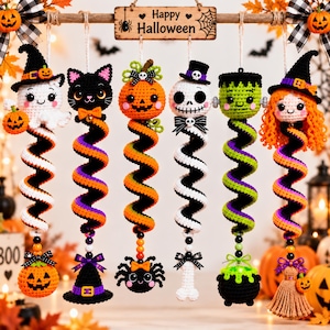May include: Six hanging crochet Halloween ornaments suspended from a wooden sign reading Happy Halloween. The figures include a ghost, black cat, pumpkin, skull, Frankenstein monster, and witch, each featuring a colorful spiral base and beads.