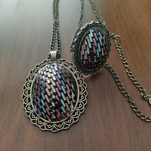 Flerfärgat Tel Kirma halsband och ringset