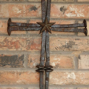 Railroad spike cross with star