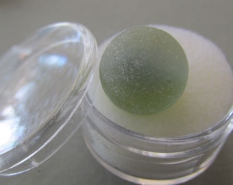 Mármore de vidro marinho caído: achado de praia na Ilha do Príncipe Eduardo