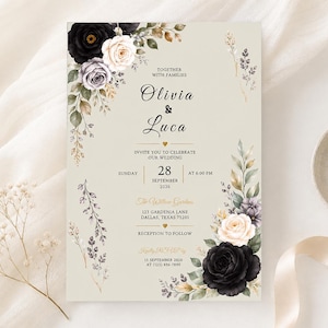Könnte beinhalten: Eine rechteckige Hochzeitseinladungskarte auf hellbeigem Hintergrund mit Aquarell-Blumenarrangements in Schwarz, Weiß und Lavendel. Der Text lautet Olivia & Luca, Sunday 28 September 2026 at 6:00 PM, The Willow Gardens, 123 Gardenia Lane, Dallas, Texas 75201.