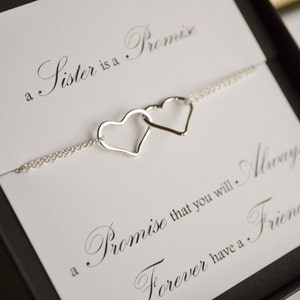 Collana con promessa sorella con cuori in argento sterling collegati