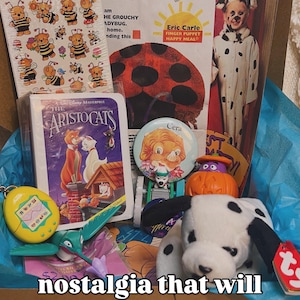 May include: A collection of vintage toys and memorabilia including a sheet of bee stickers, a McDonald's Happy Meal bag, a VHS case for The Aristocats, a Cera button, a small pumpkin figure, a yellow digital pet, and a plush dalmatian dog toy.