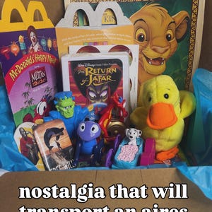 May include: A collection of vintage McDonald's Happy Meal boxes, a Disney The Return of Jafar VHS case, a plush yellow duck, and various plastic character figurines including a green monster, a purple creature, and a small spotted dog.