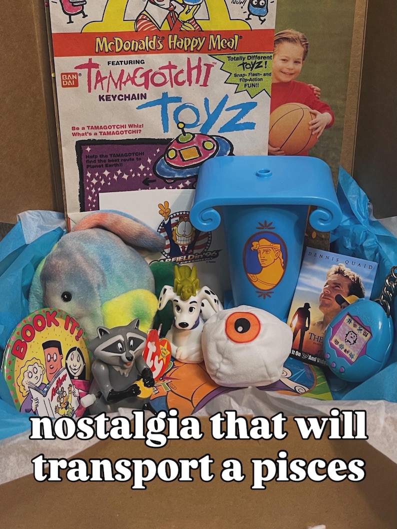 May include: A collection of vintage items including a McDonald's Happy Meal Tamagotchi bag, a blue Hercules cup, a plush toy, a raccoon figure, a white dog figurine, a plush eyeball, a Dennis Quaid movie card, and a blue Tamagotchi keychain.