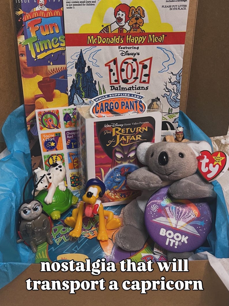 May include: A collection of vintage items including a McDonald's Happy Meal box featuring 101 Dalmatians, a VHS tape of The Return of Jafar, a Ty koala plush, a Pluto figurine, a Dalmatian toy, a Book It! button, and a Fun Times magazine issue.