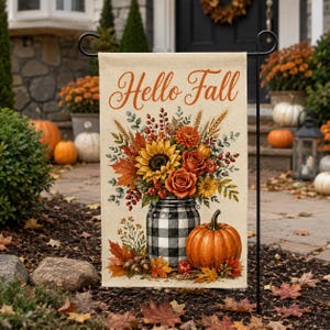 May include: A rectangular garden flag featuring the text Hello Fall in a cursive script above a floral arrangement of sunflowers, roses, and wheat in a black and white buffalo check mason jar, with a large orange pumpkin and autumn leaves.