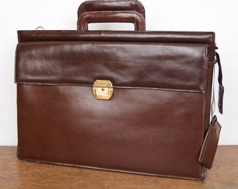 1980s Brown Leather Briefcase  with retractable handles & front gold buckle pouch