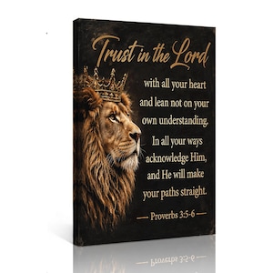 May include: A rectangular wall art canvas featuring a lion wearing a crown on the left side against a dark background. The text reads: Trust in the Lord with all your heart and lean not on your own understanding. In all your ways acknowledge Him, and He will make your paths straight. Proverbs 3:5-6.