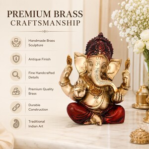 May include: A brass sculpture of the deity Ganesha with an antique finish, featuring red accents on the headpiece and base. The text reads: PREMIUM BRASS CRAFTSMANSHIP, Handmade Brass Sculpture, Antique Finish, Fine Handcrafted Details, Premium Quality Brass, Durable Construction, Traditional Indian Art.