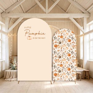 May include: Two arched backdrop covers featuring a cream-coloured panel with the text A LITTLE Pumpkin IS ON THE WAY and a single pumpkin illustration, alongside a second panel with a repeating pattern of orange pumpkins and brown foliage.