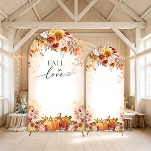May include: Two arched backdrop covers featuring a fall-themed design with orange pumpkins, autumn leaves, and floral accents in shades of brown, yellow, and cream. The larger arch displays the black text "FALL in love" with a small heart icon.