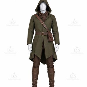 May include: A hooded olive green coat worn over a brown scarf, brown trousers, and brown leather boots. The outfit includes a brown leather belt with a small attached pouch and a brown leather shoulder strap with a metal buckle, displayed on a mannequin.