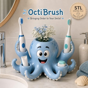May include: A light blue octopus-shaped bathroom organiser with a smiling face, holding two electric toothbrushes, a tube of toothpaste, and a container of dental floss. The top centre holds a small bouquet of light blue and white flowers.