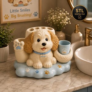 May include: A cream-coloured puppy toothbrush holder with brown ears, a blue collar with a tag reading GOOD BOY, and a light blue base decorated with paw prints. The holder features a light blue cup and a paw-shaped cup for holding toothbrushes.