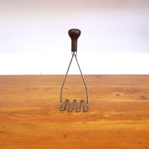 Vintage Brown Bakelite Potato Masher