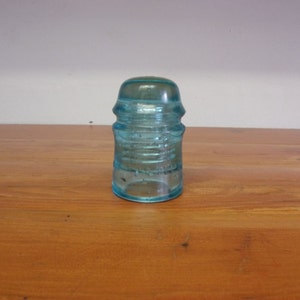 Vintage Am Tel & Tel Co aqua blue glass insulator collectible glass paper weight home decor