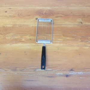 Vintage Ekco cheese tomato slicer knife black handle