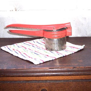 Vintage potato ricer red enamel potato masher retro kitchen gadget
