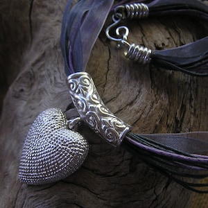 Solid Handmade Sterling Silver Heart and Bail Pendant hung on Mixed Media Necklace of Grey and Lilac Cord and Ribbon