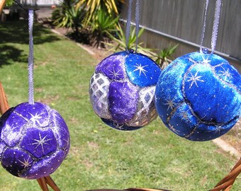 Christmas Tree Ornaments. Set of three handmade Christmas Baubles in Blue, Purple Star and Silver Material with Silver Glitter Paint