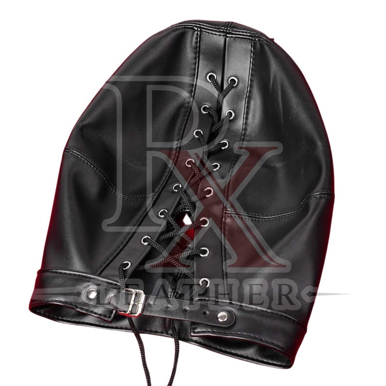 May include: A black faux leather hood featuring a central vertical lace-up closure with silver-toned metal eyelets and black cord lacing. The base of the hood includes a horizontal strap with a silver-toned metal buckle and a single metal rivet.