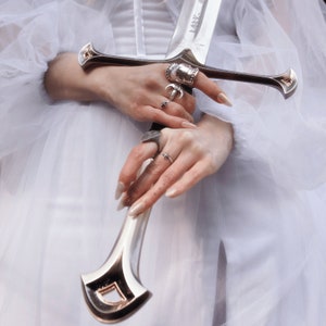 armor ring inspired by joan of arc and medieval armor and crafted in sterling silver