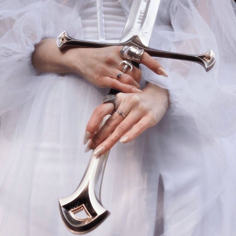 armor ring inspired by joan of arc and medieval armor and crafted in sterling silver