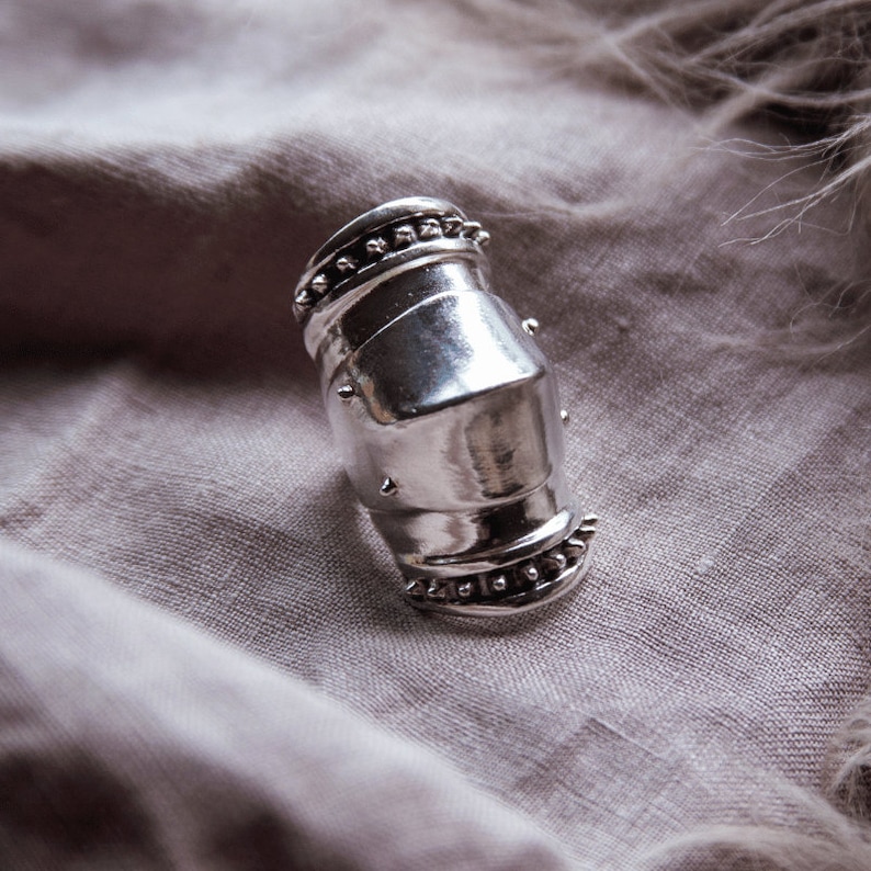 armor ring inspired by joan of arc and medieval armor and crafted in sterling silver