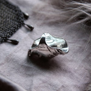 armor ring inspired by joan of arc and medieval armor and crafted in sterling silver