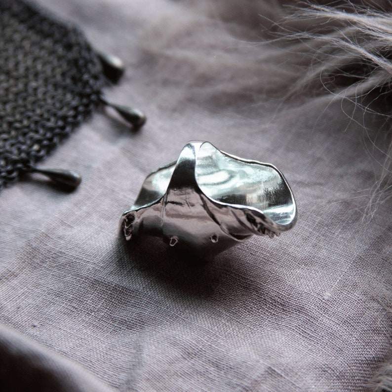 armor ring inspired by joan of arc and medieval armor and crafted in sterling silver