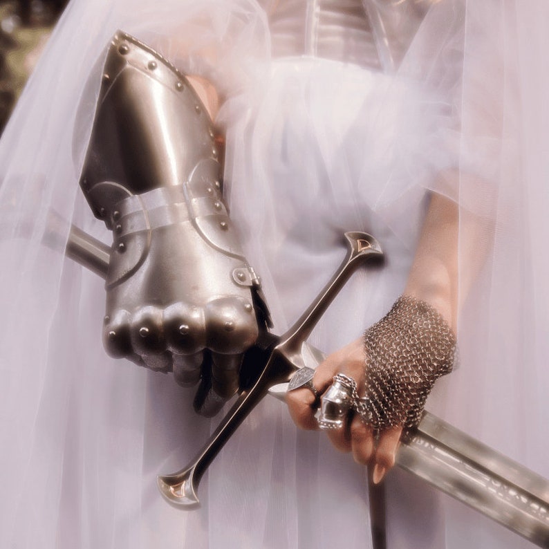 armor ring inspired by joan of arc and medieval armor and crafted in sterling silver