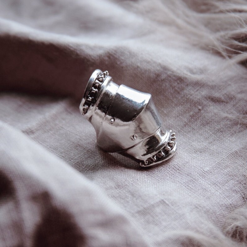 armor ring inspired by joan of arc and medieval armor and crafted in sterling silver